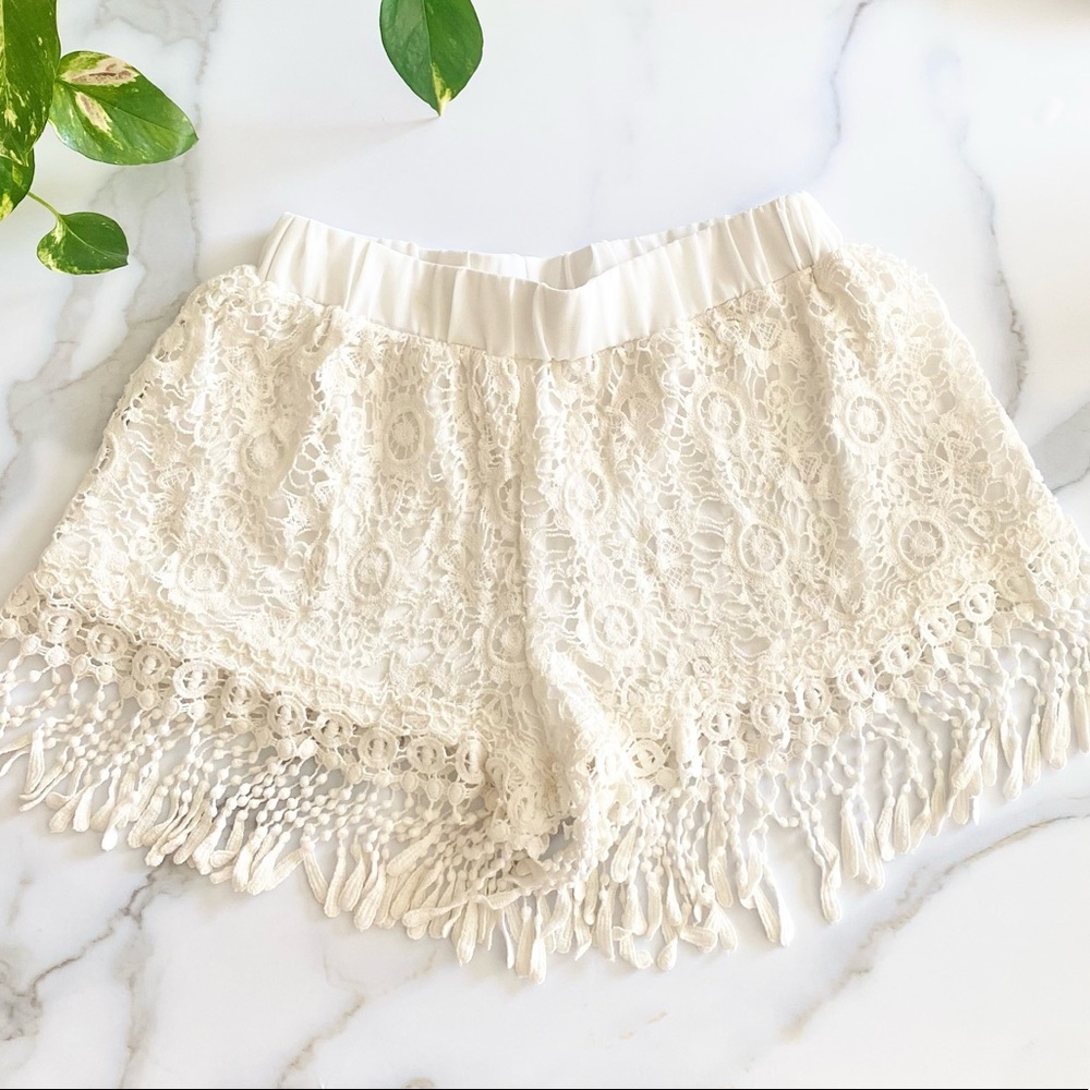 White crochet tasseled shorts